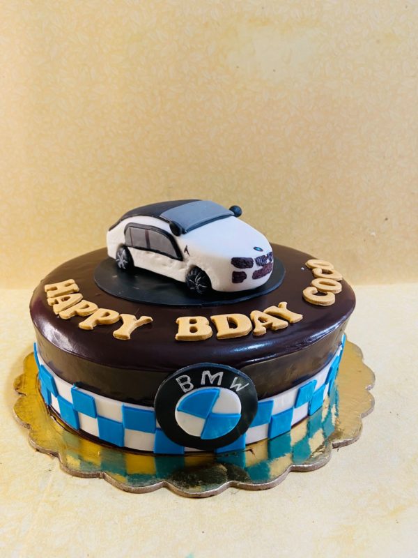 BMW theme cake with sugar paste car... - Delicious Delights | Facebook